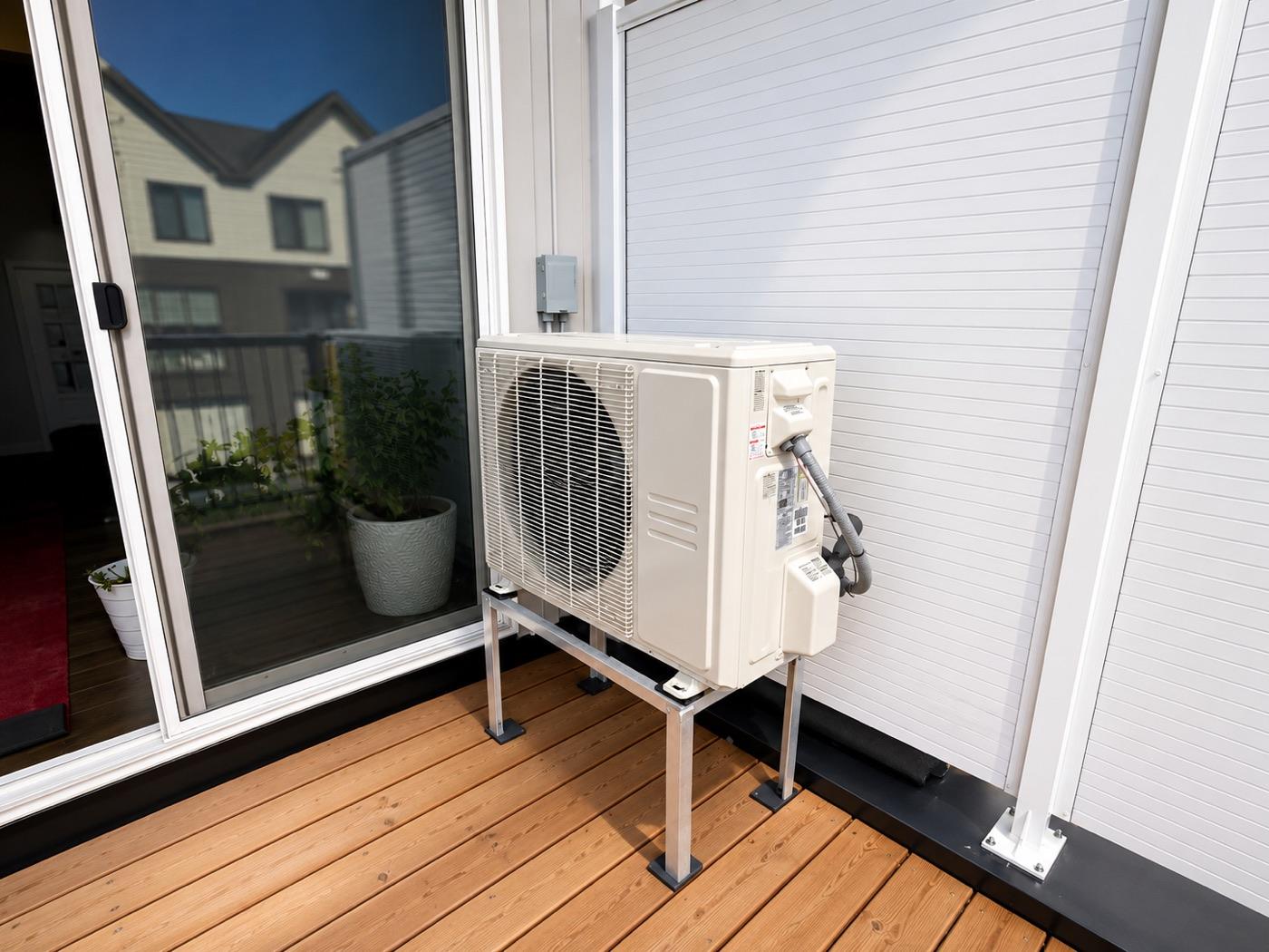 An outdoor heat pump installed by Thermoza